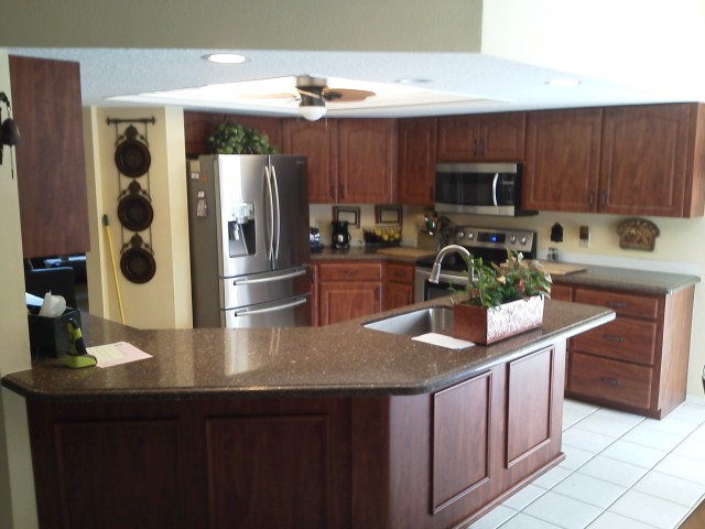 Kitchen Island and cabinets after Kitchen Facelifts refacing